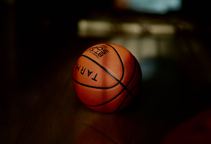 Download Basketball Ball At Dark Wallpaper | Wallpapers.com