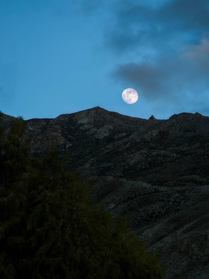 Download Beautiful Full Moon Over Mountain Wallpaper | Wallpapers.com