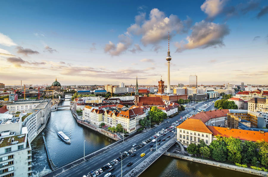 Download Berlin Sunrise Cityscape Wallpaper | Wallpapers.com