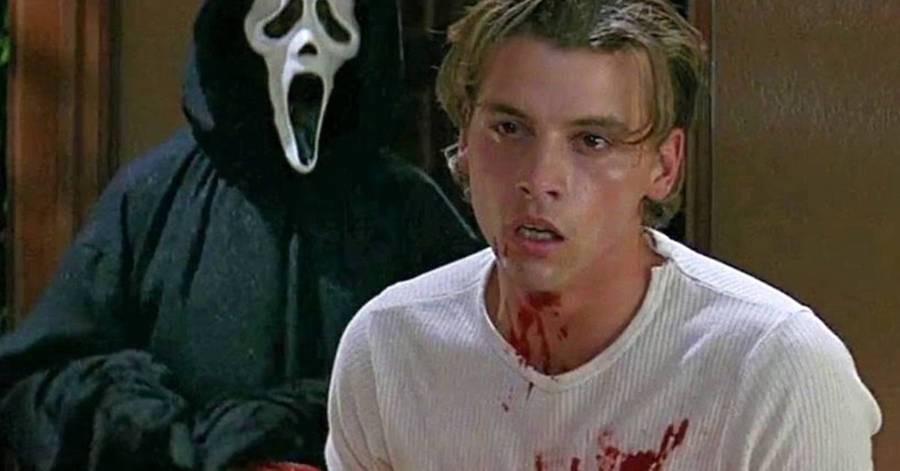 Download Billy Loomis With Ghostface Behind Wallpaper | Wallpapers.com