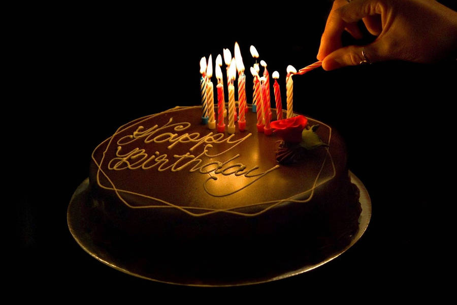 Download Birthday Cake With Lit Candles Wallpaper | Wallpapers.com