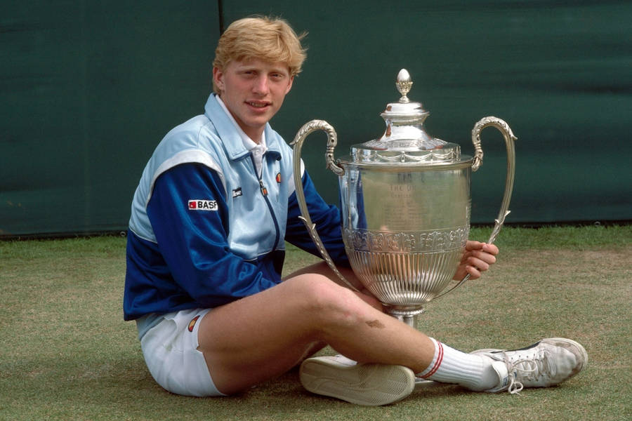 Download Boris Becker With Trophy Wallpaper | Wallpapers.com