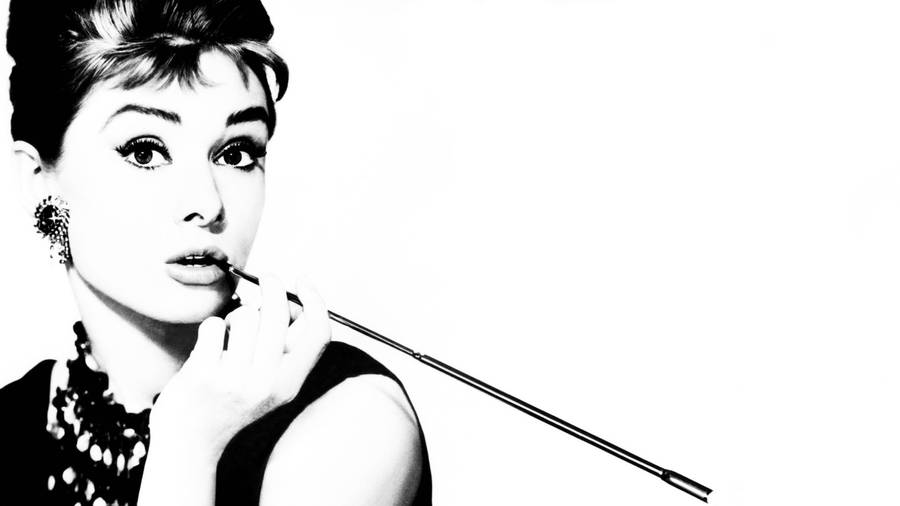 Download Breakfast At Tiffany's Audrey Hepburn Wallpaper | Wallpapers.com