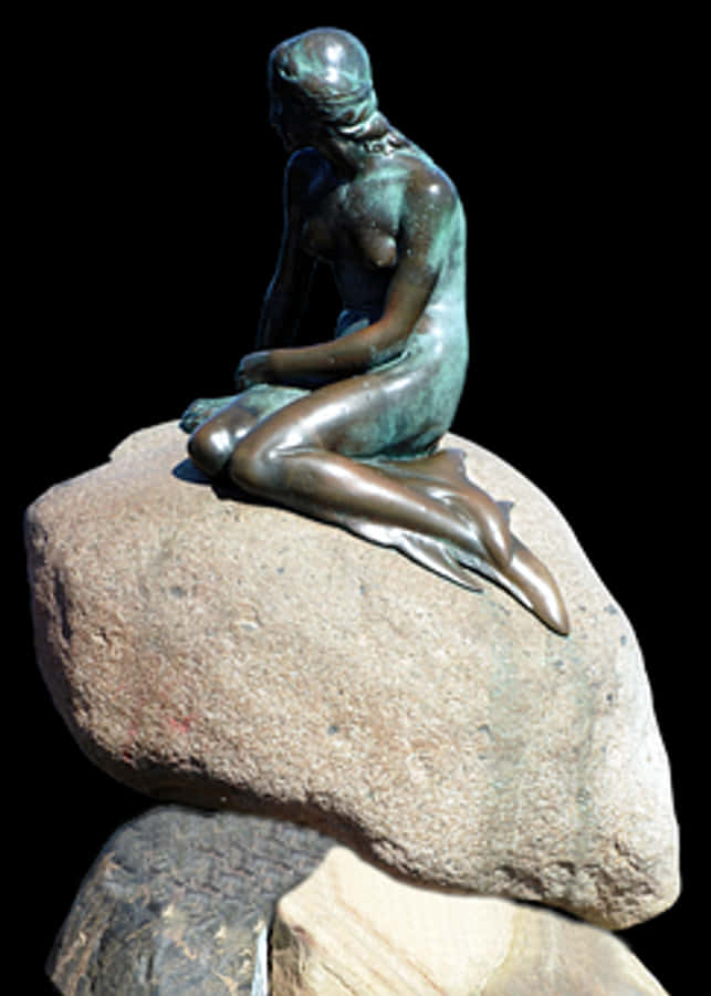 Bronze Mermaid Sculptureon Rocks