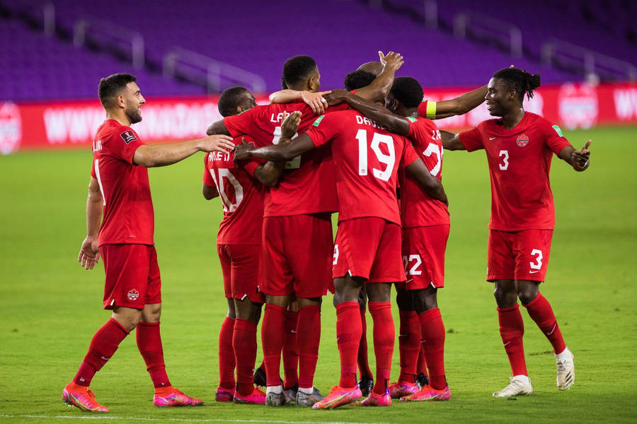 Download Canada National Football Team Group Hug Wallpaper | Wallpapers.com