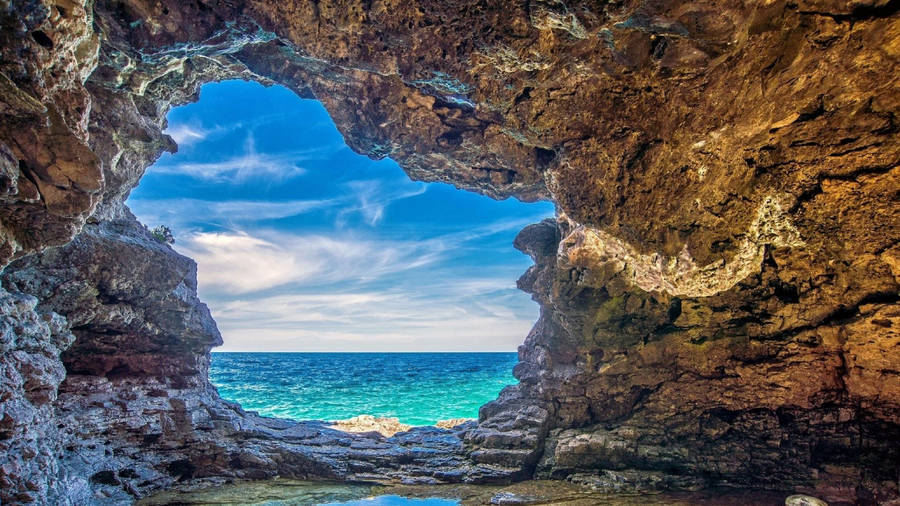 Download Cave On The Seaside Wallpaper | Wallpapers.com