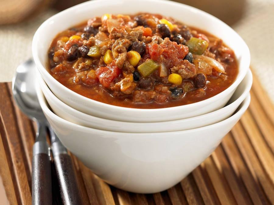 Download Chili Con Carne On Food Bowls Wallpaper | Wallpapers.com