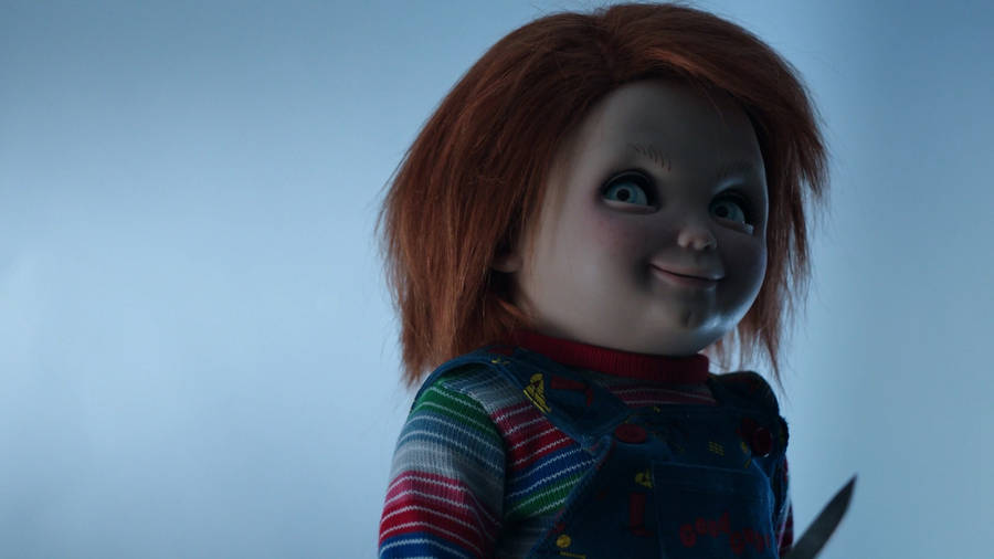 Download Chucky With Smirking Face Wallpaper | Wallpapers.com