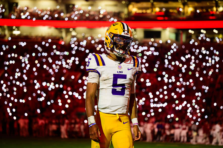 Giocatore di Football LSU sotto le Luci dello Stadio