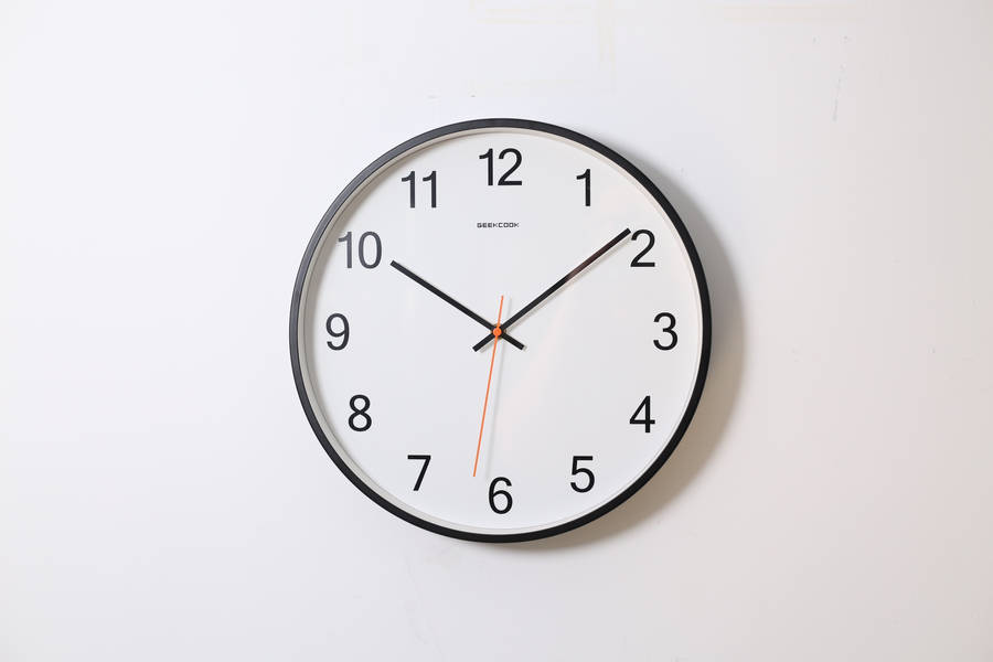 Clock with red pointer wallpaper