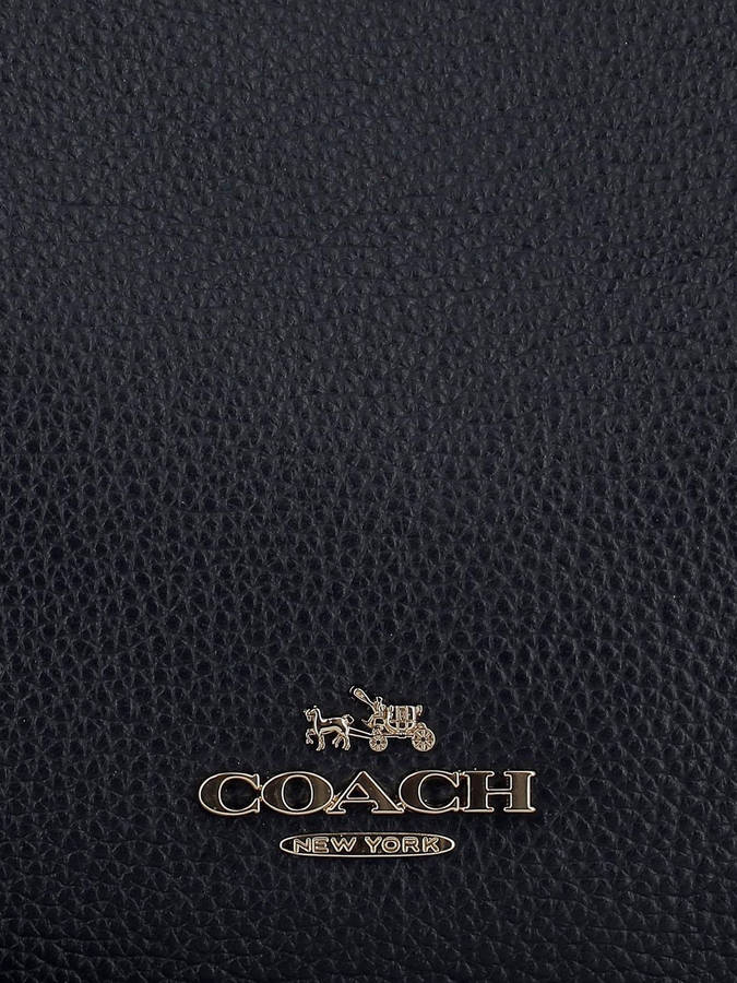 Download Coach Logo On Black Leather Wallpaper Wallpapers Com