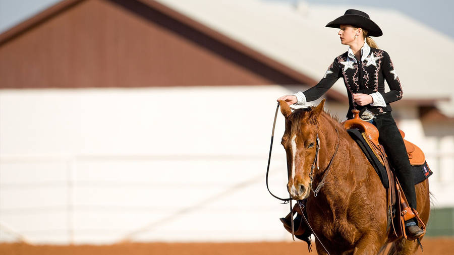 Download Cowgirl Riding A Horse Wallpaper | Wallpapers.com