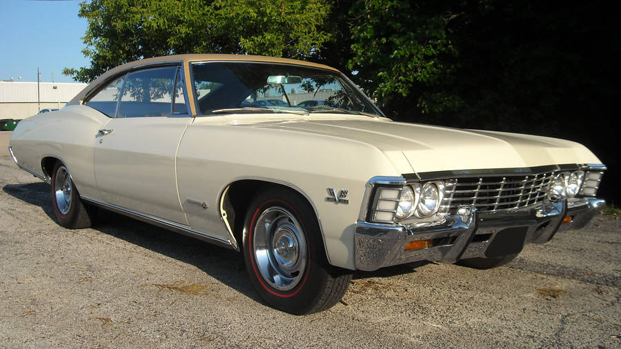 Download Cream Chevrolet Impala 1967 Wallpaper | Wallpapers.com