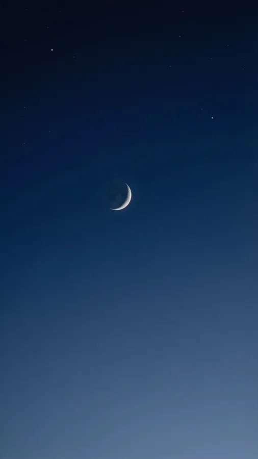 A minimalistic night sky with a crescent moon and one star.