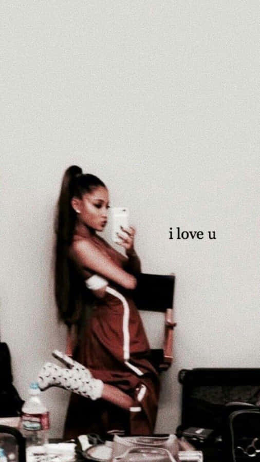 ÆstetiskAriana Grande 900 x 1600 baggrundsbillede.