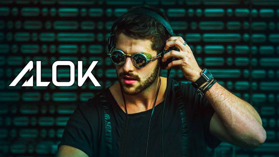 Download Dj Alok Free Fire Black Headset Wallpaper | Wallpapers.com