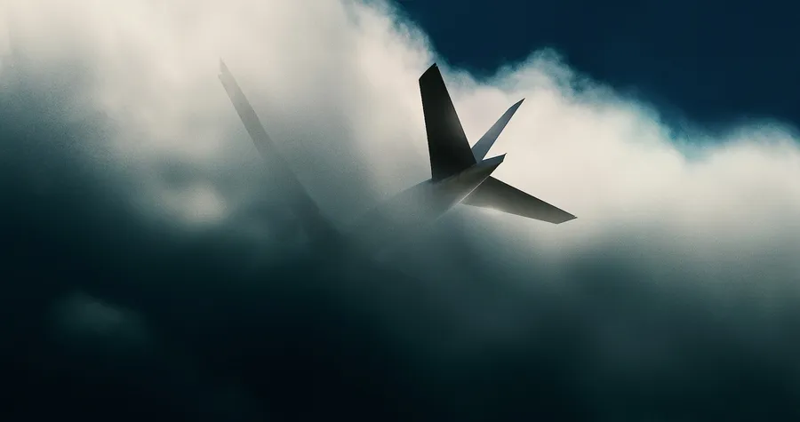 Airplane Vanishing Into Clouds