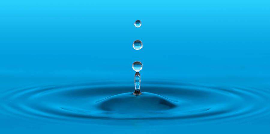 water drop in blue water