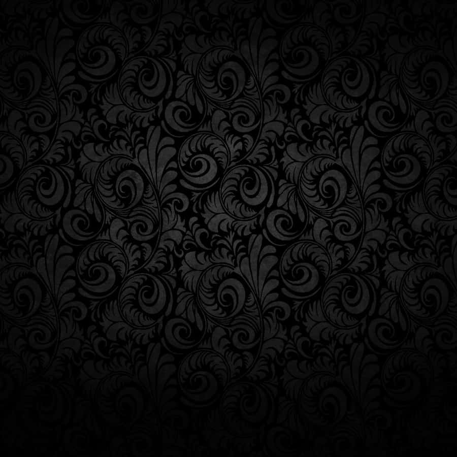 iPadpreto com padrões abstratos em espiral.