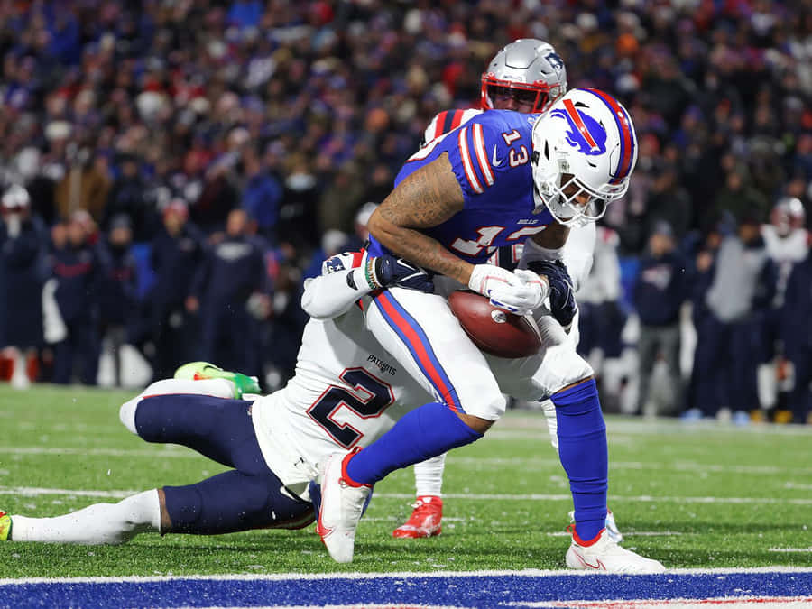 Buffalo Bills Spieler während des Spiels getackelt