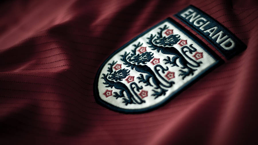 Download England Football Crest Red Shirt Wallpaper | Wallpapers.com