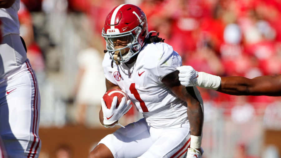 Ação de Jahmyr Gibbs no Futebol da Alabama