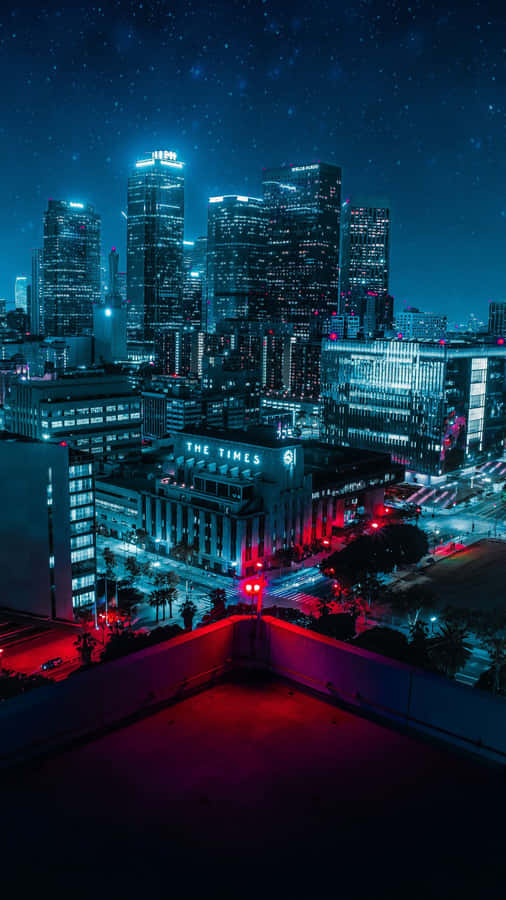 Città Notturna Grattacieli Sotto le Stelle.jpg