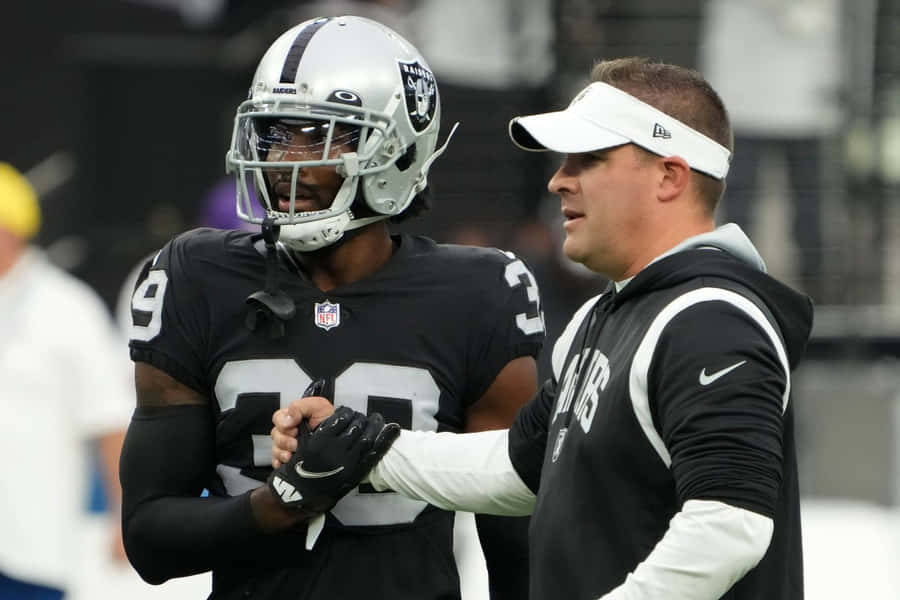 Discussione tra Giocatore e Allenatore dei Raiders