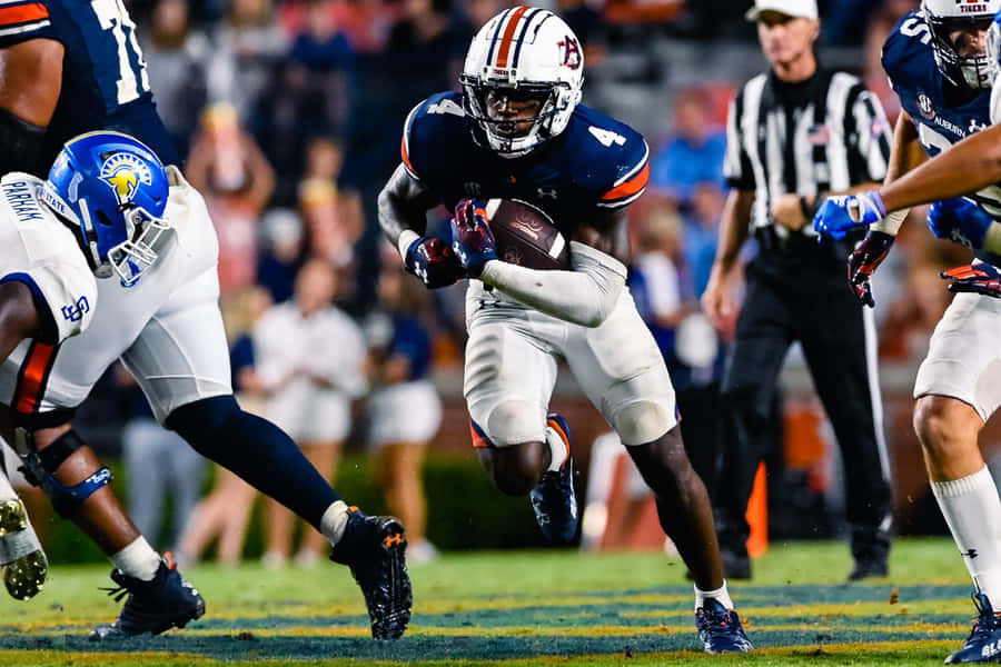 Azione di Football di Tank Bigsby Auburn