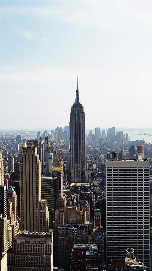 EmpireState Building på en klar dag er det bedste New York-baggrundsbillede.
