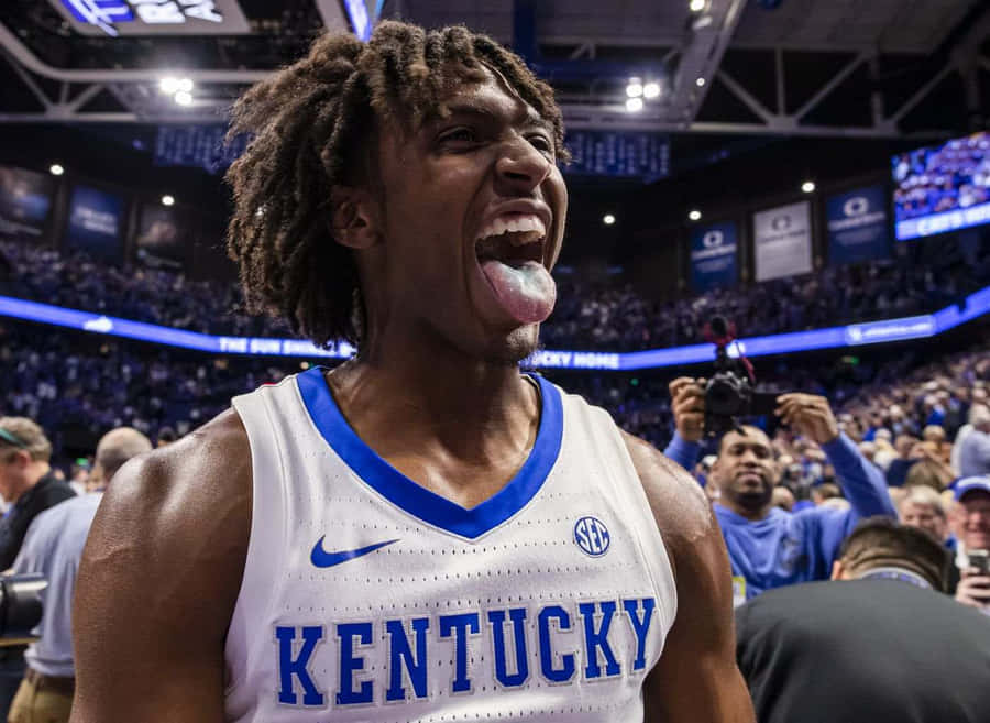 Celebração de Tyrese Maxey com Uniforme do Kentucky