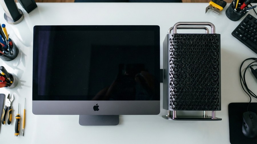A top-down view of a Mac Studio and Studio Display in a clean setup.