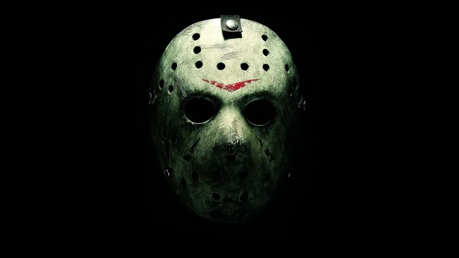 Jason Voorhees mask with black background.