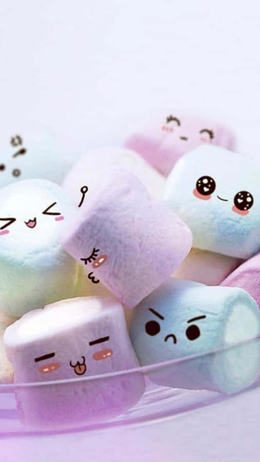 NiedlicherHintergrund mit Marshmallows und Gesichtern.