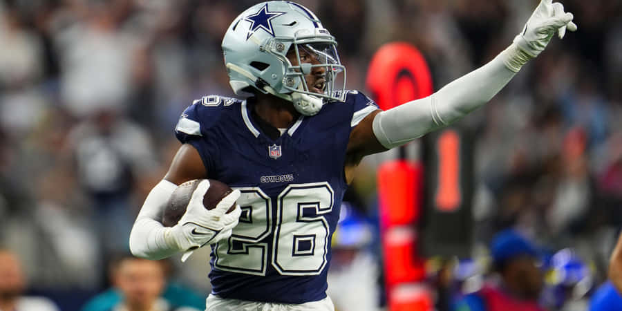 Dallas Cowboys Spieler 26 in Aktion.jpg