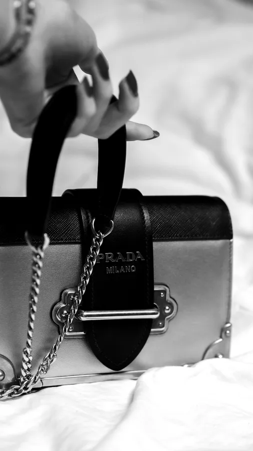 Prada bag with pointed nails grayscale mobile wallpaper.