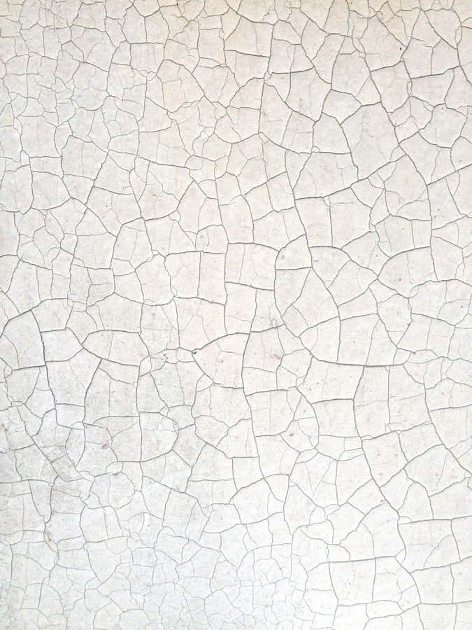 Fundode tela branco cheio de rachaduras.