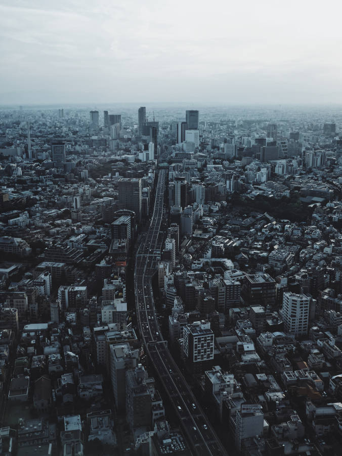 Download Gloomy City View Of Tokyo Wallpaper | Wallpapers.com