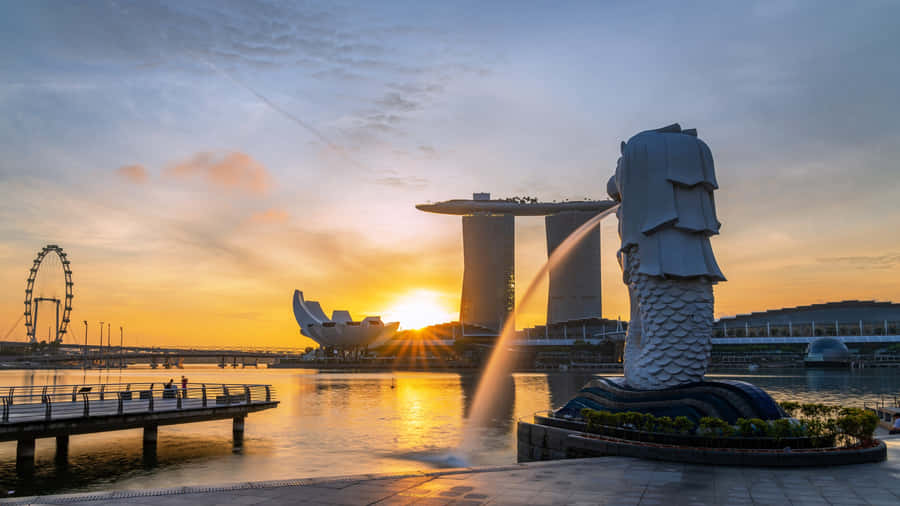 Soluppgång vid Merlion Park Singapore