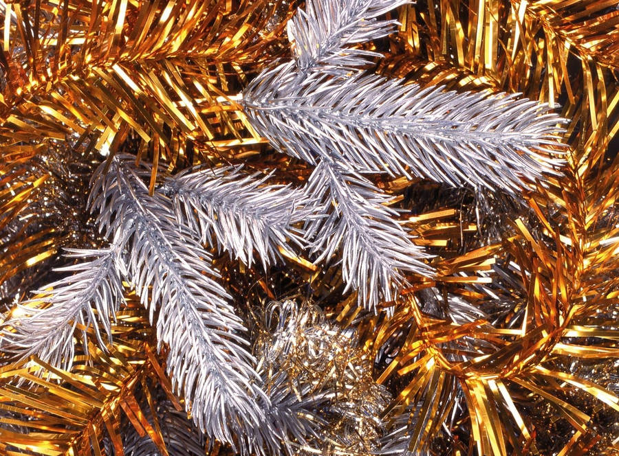 Gold and silver tinsel for Christmas wallpaper.