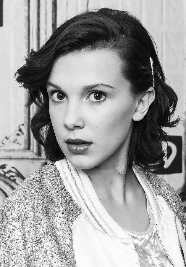 Download Gorgeous Millie Bobby Brown Portrait Wallpaper | Wallpapers.com