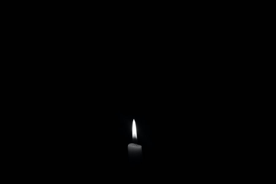 Sfondo nero Lume di candela