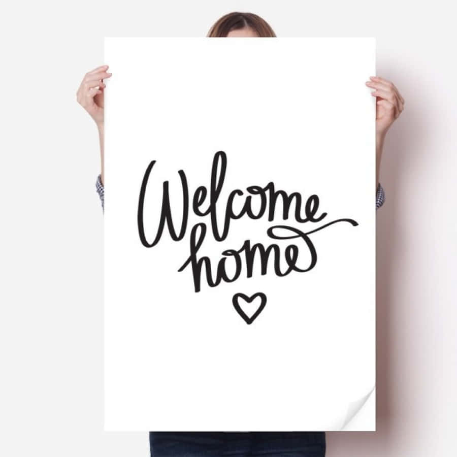 Willkommen zu Hause Plakat von Frau gehalten