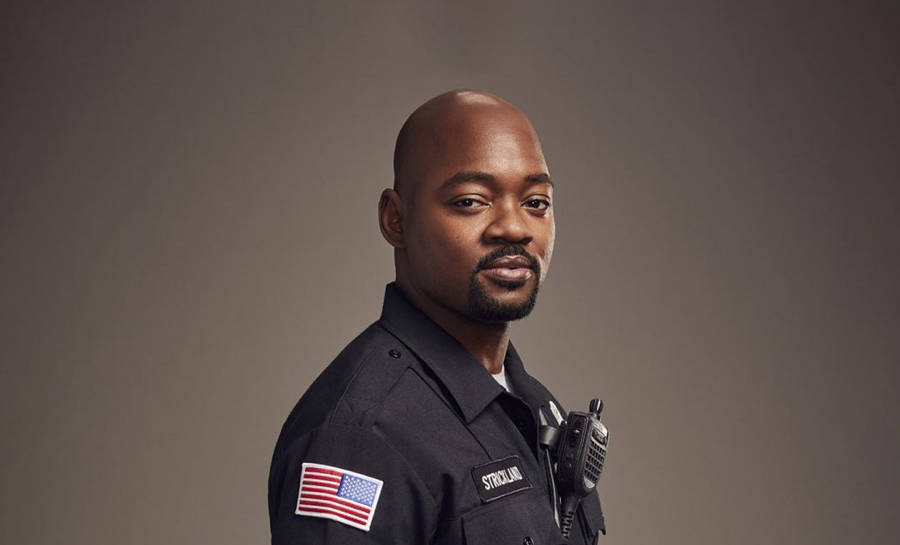 Download Handsome Black Man Paul Strickland Wallpaper | Wallpapers.com