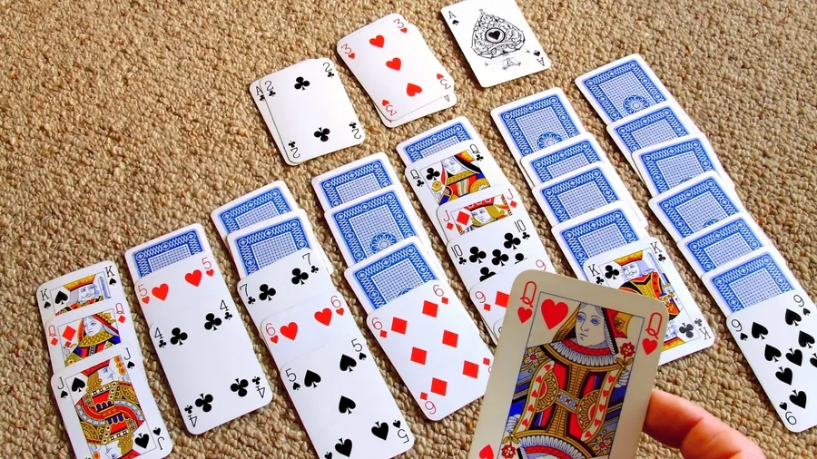 Playing Solitaire wallpaper