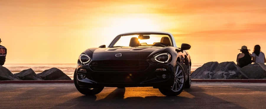 Fiat124 Spider 1032 x 423 Hintergrundbild