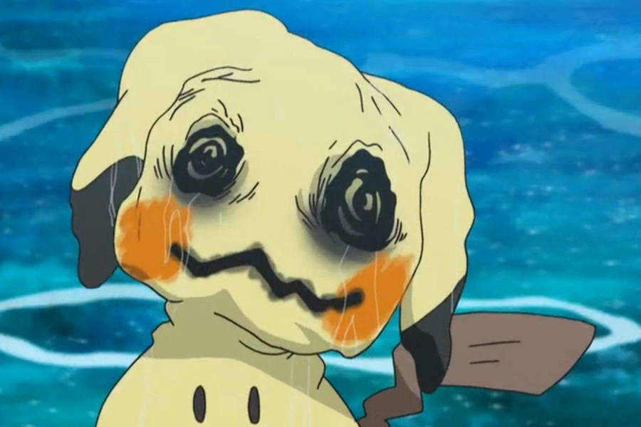 Einweißes und gelbes Pokémon mit einem großen Mund.