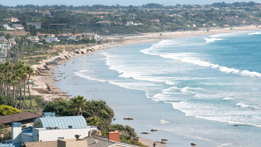 1440pHintergrundbild mit winterlichem Motiv: Malibu Strandhäuser