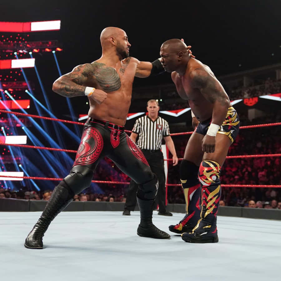 SheltonBenjamin WWE Raw Ricochet Punch would be translated to "Shelton Benjamin WWE Raw Ricochet Skaft" in Swedish. When talking about computer or mobile wallpaper, this would typically refer to an image of the wrestlers or perhaps a still shot from a match where Ricochet lands a punch on Benjamin. The name of the wrestlers would remain the same in Swedish, but the word for "punch" (skaft) would need to be added to convey the action.