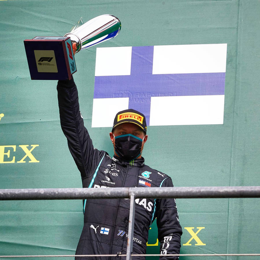 "ValtteriBottas Trophy" would be translated to "Valtteri Bottas-trofén" in Swedish. This could potentially be used as a title or caption on a computer or mobile wallpaper featuring an image of the Formula 1 driver, Valtteri Bottas, with his trophy.